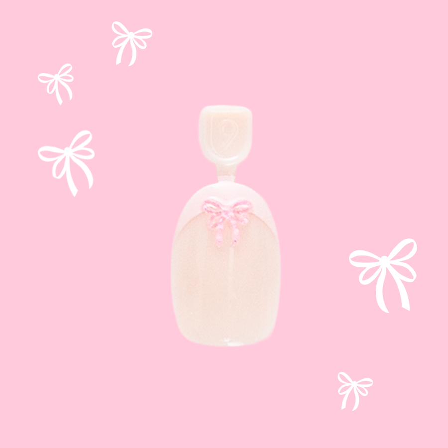 Wrapped in Pink - Pressies | Short Medium | Round showing baby pink french press on nail with 3D bow detail on pink background