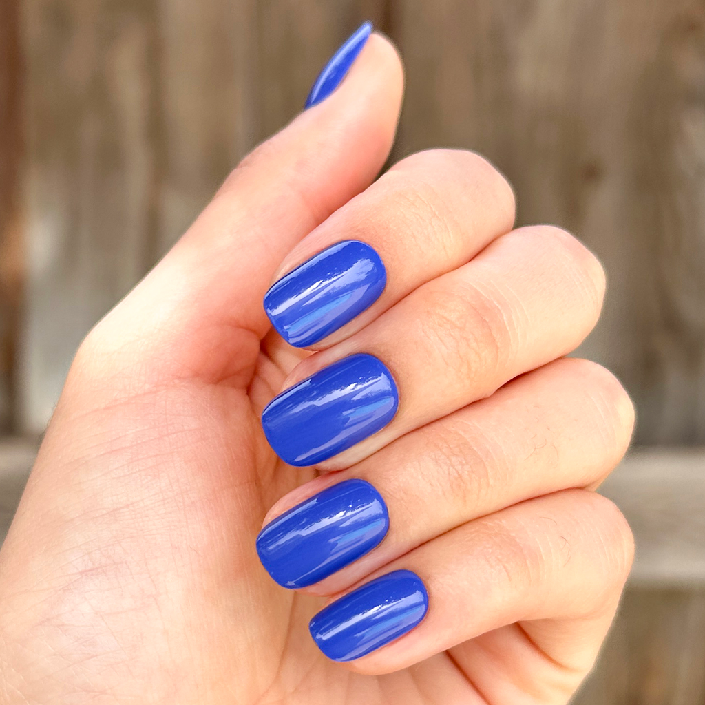 Breezy | Short | Squoval - Tab Press-On nails in vibrant cobalt blue for easy at-home manicure with smooth finish