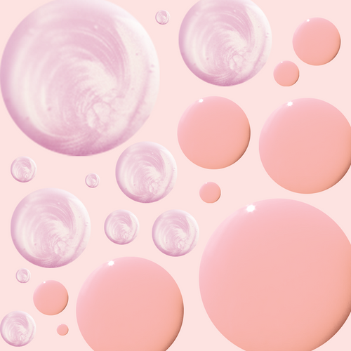 Close-up of pink and shimmery polish droplets arranged randomly on pale background for Candy Shoppe mani display