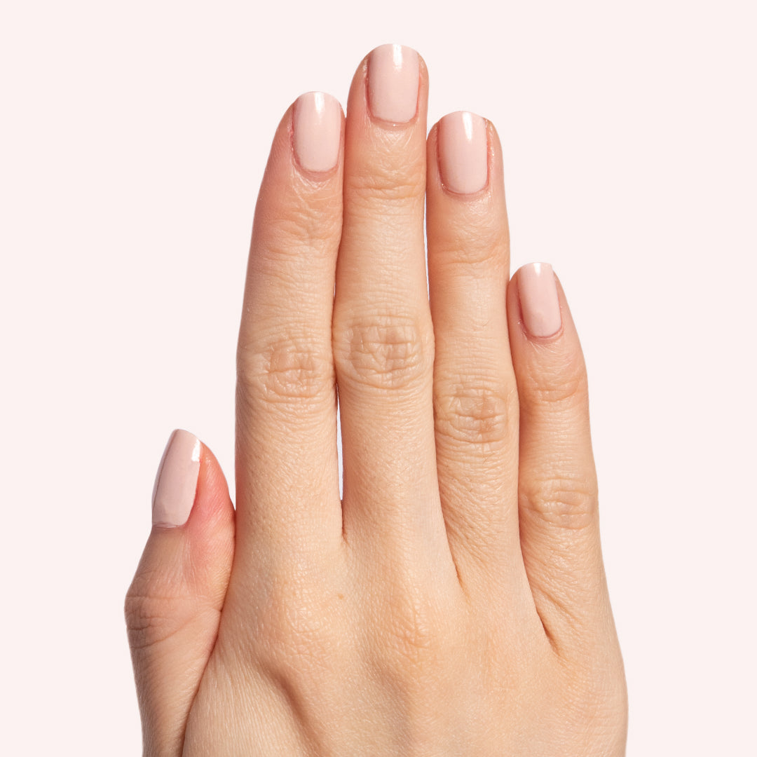 hand displaying cold foam pls nail polish with a subtle shimmer on natural nails for a polished manicure