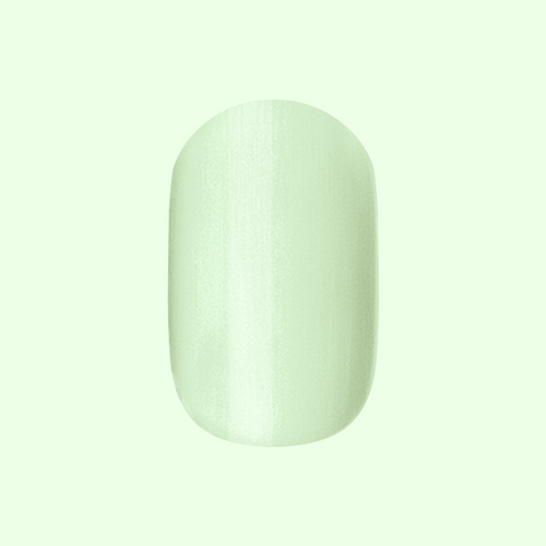 Corrigan | Extra Short | Round - Tab Press-On nail in soft pastel mint green for easy at-home manicure look