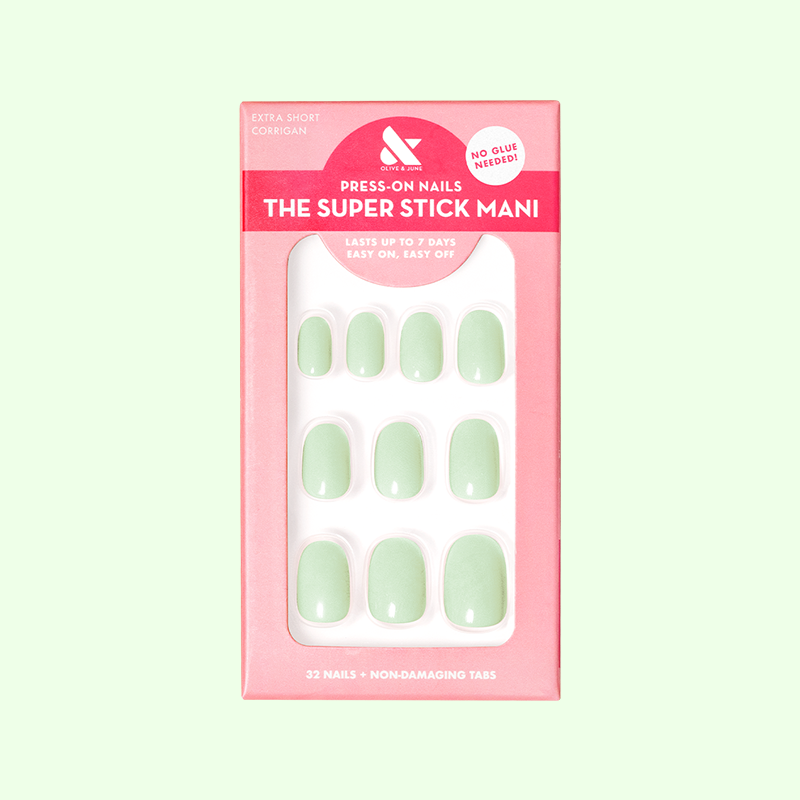 Corrigan | Extra Short | Round - Tab Press-On nails in pastel mint green for easy at-home manicure with gentle tabs