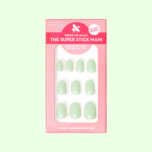 Corrigan | Extra Short | Round - Tab Press-On nails in pastel mint green for easy at-home manicure with gentle tabs