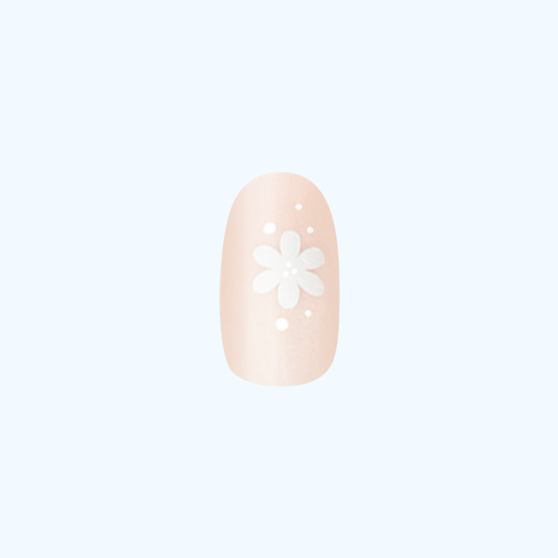 Daisy Dance - Press-On | Short | Round showing single neutral beige nail with white daisy design for easy at-home mani