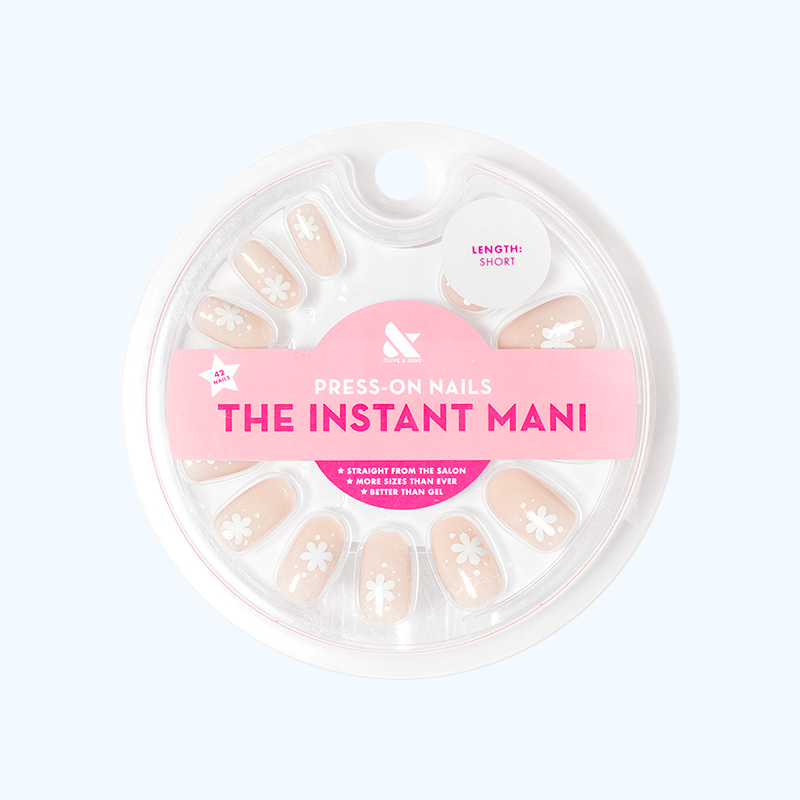 Daisy Dance - Press-On | Short | Round with neutral beige base and white floral design for easy at-home mani application
