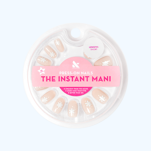 Daisy Dance - Press-On | Short | Round with neutral beige base and white floral design for easy at-home mani application