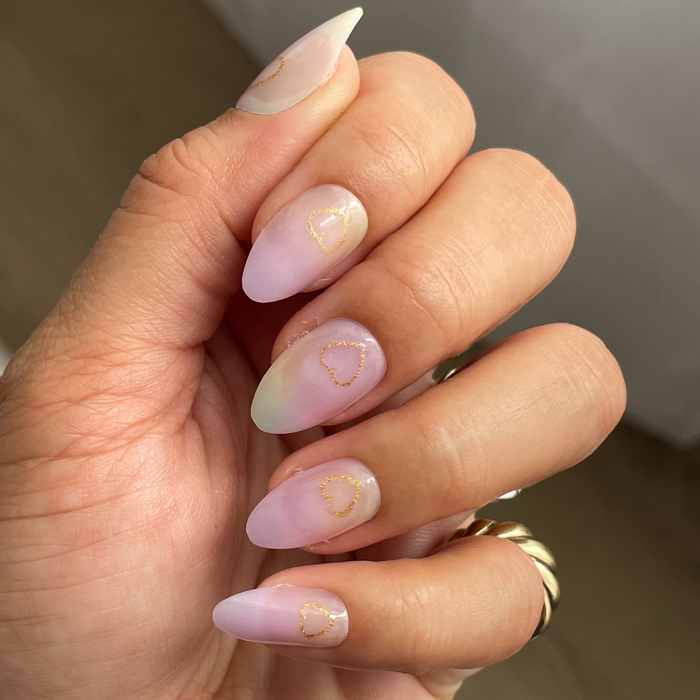 Glitter Heart Ombre | Almond | Medium press-on nails with subtle rainbow ombre and delicate gold heart outline manicure