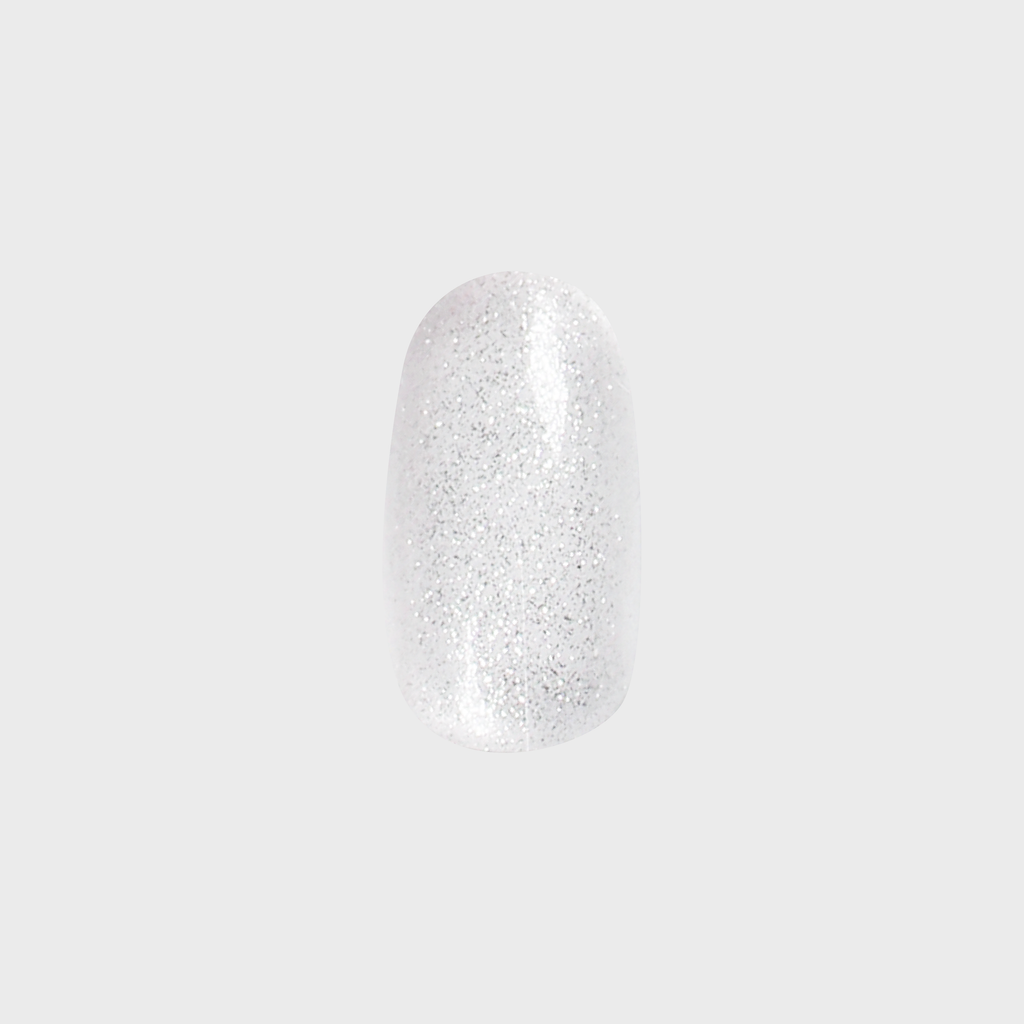 Pure Glitter - Press-On | Short | Round showing a single short round false nail with silver glitter in a clear base for quick mani
