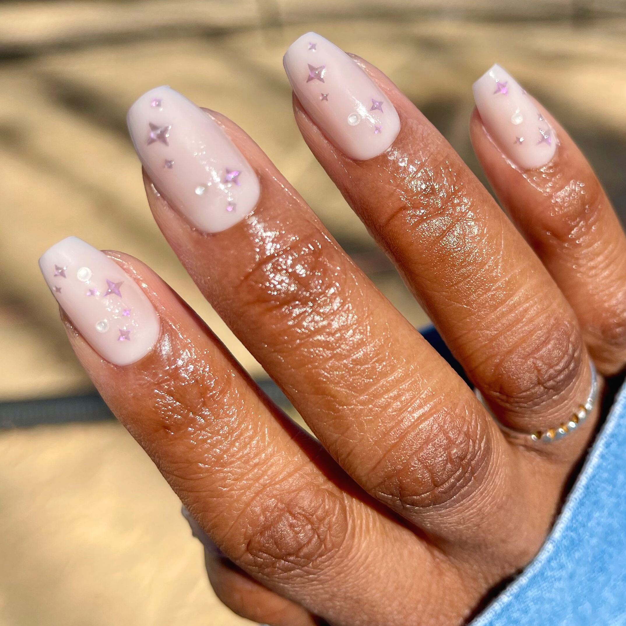 Puffy Sparkles & Pearls - Press-On | Medium | Coffin with soft neutral base and 3D pearl and sparkle accents on natural hand