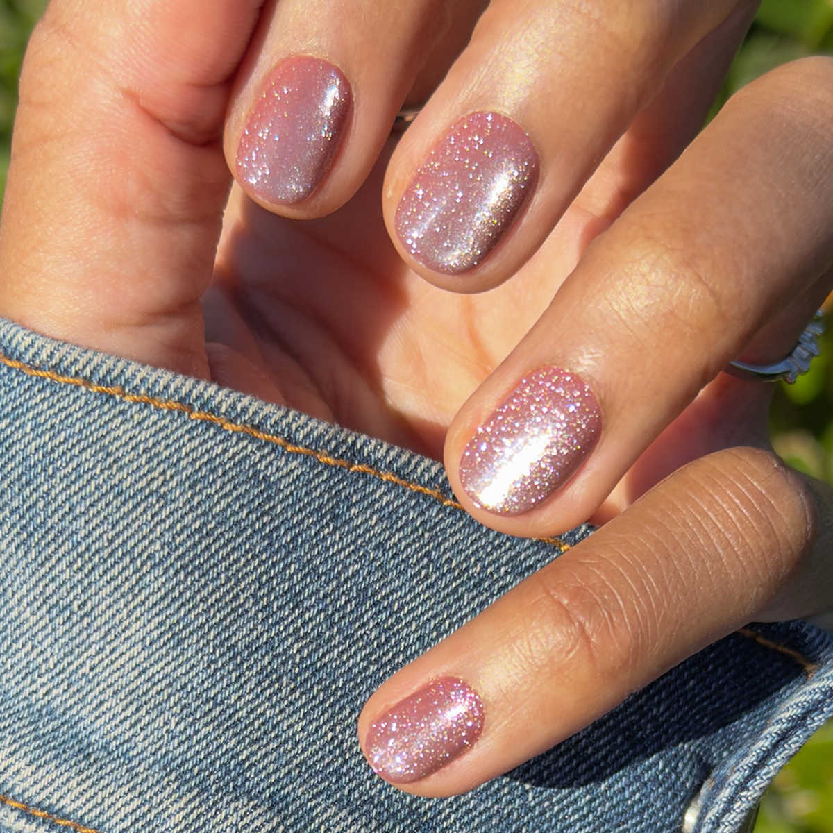 Shacket Velvet | Extra Short | Round - Tab Press-On nails in warm neutral rose with subtle glitter sparkle on natural nails