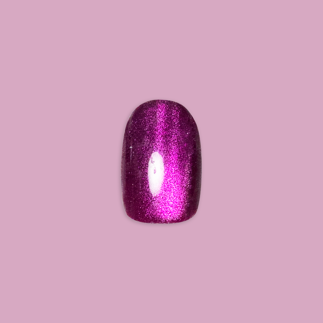 Velvet Plaza - Press-On | Extra Short | Round single deep mulberry chrome velvet finish false nail on pink background